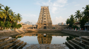 Tamil Nadu Vishnu temples: tall Dravidian gopuram tower at sunrise