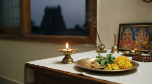 Akshaya Tritiya date and time puja setup with ghee lamp, sandalwood and tulsi on a home altar at dawn