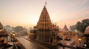 Mahakaleshwar darshan timings guide showing the Ujjain Mahakal temple shikhara at dawn