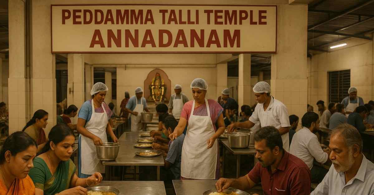 Devotees eating free annadanam meal at Peddamma Talli Temple while volunteers serve food in the dining hall