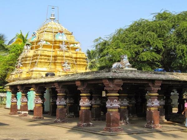 Mukteswara Swamy Temple Online travel guide with temple and river background